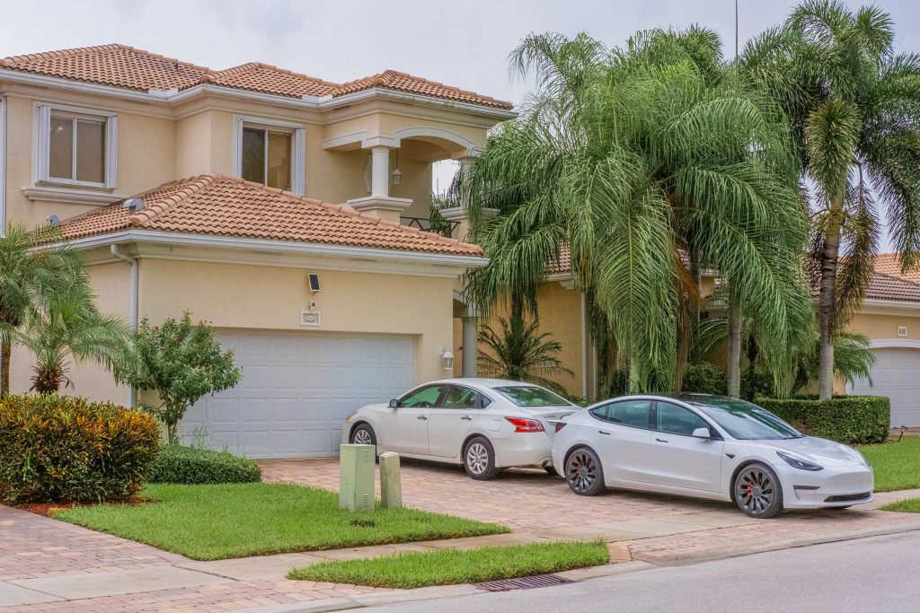 Supernova Accordion Shutters (Hurricane Shutter) on a home in Boynton Beach, Florida