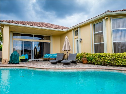 Accordion shutters on a backyard of a South Florida Home